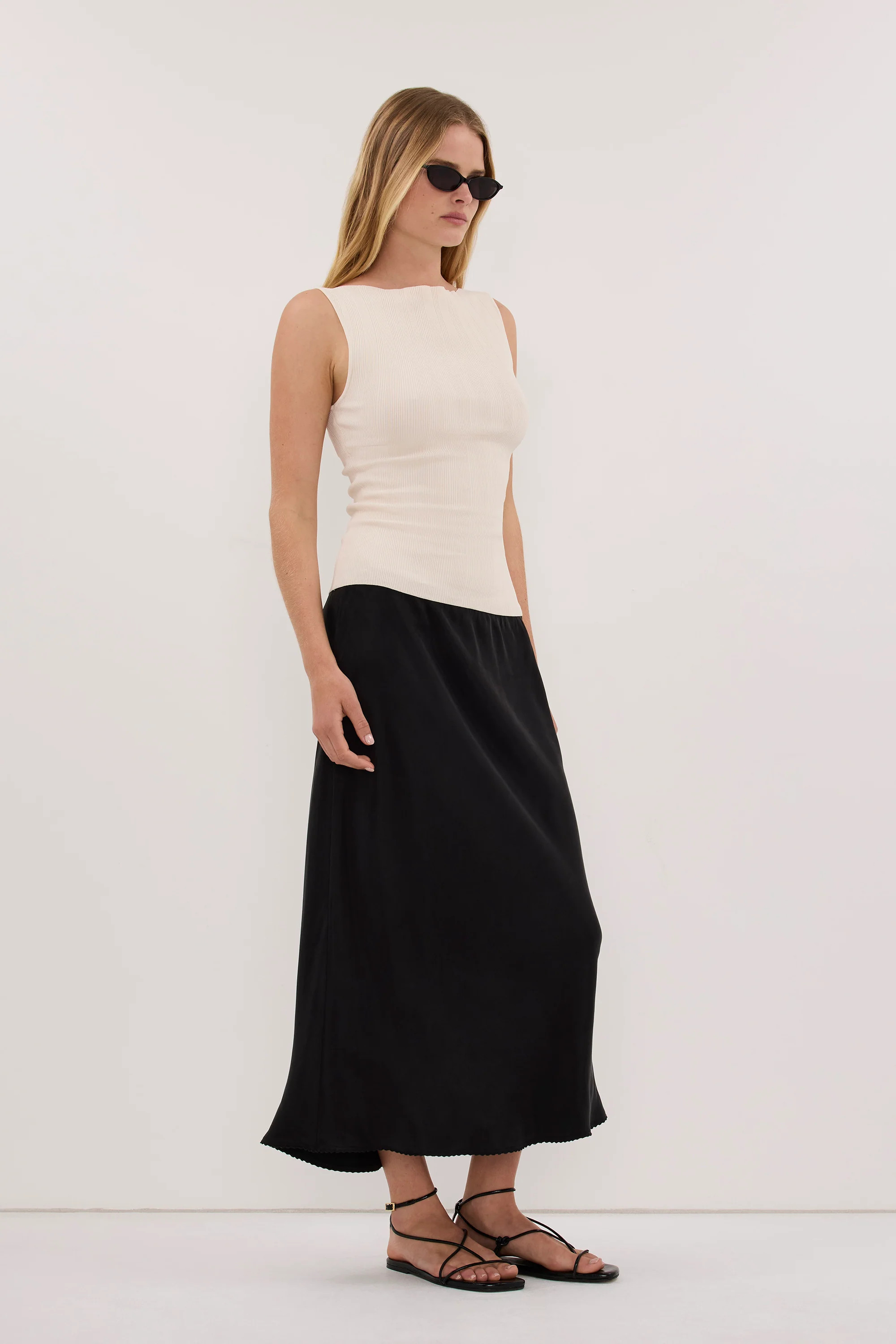 DOVE MILK SLEEVELESS RIBBED KNIT TANK | DISSH
