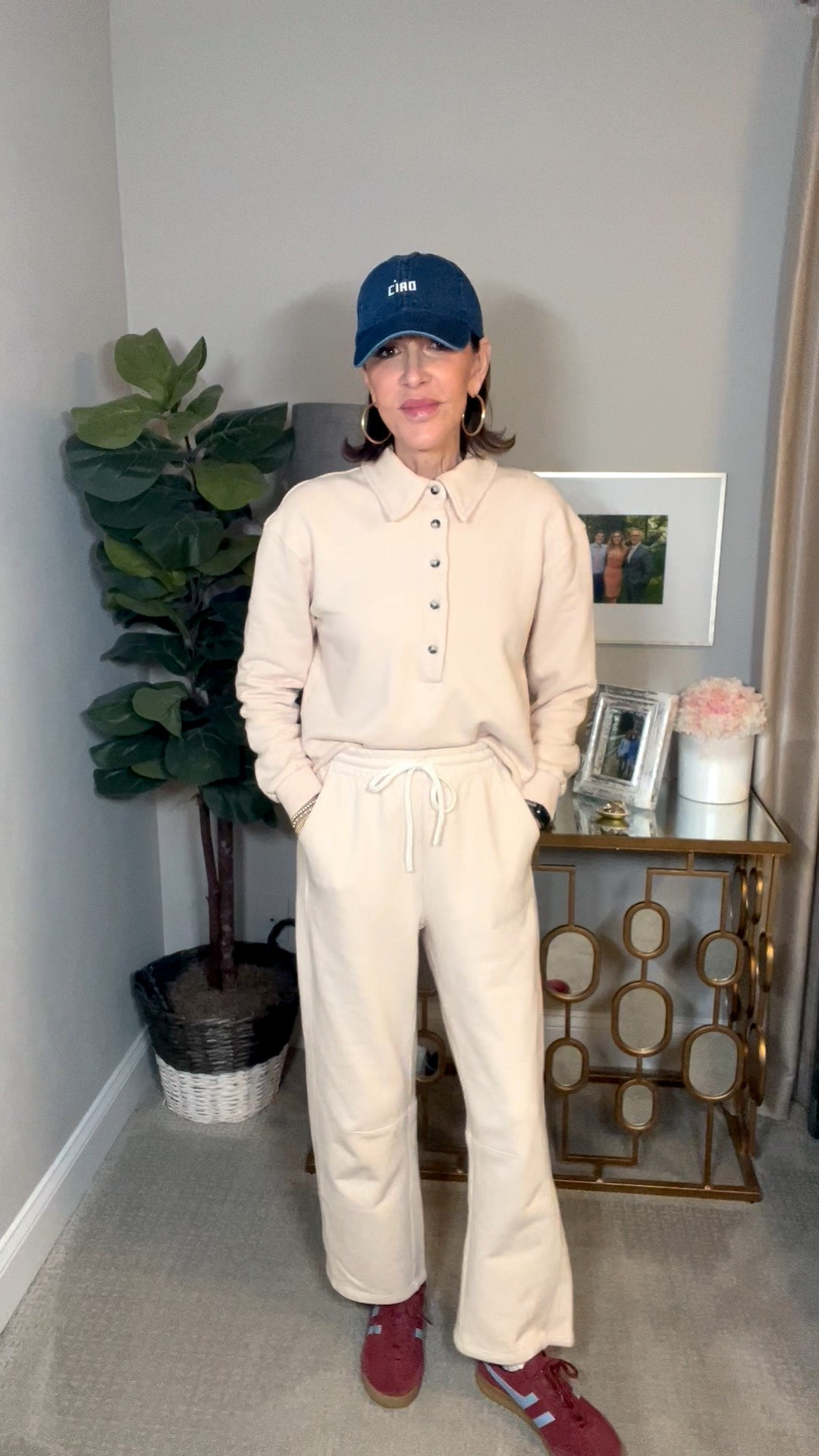 cream pullover, cream sweatpants, red sneakers, gold hoop earrings, ciao baseball cap, casual outfit, travel outfit, over 50 outfits 

#LTKootd #LTKOver40 #LTKSeasonal