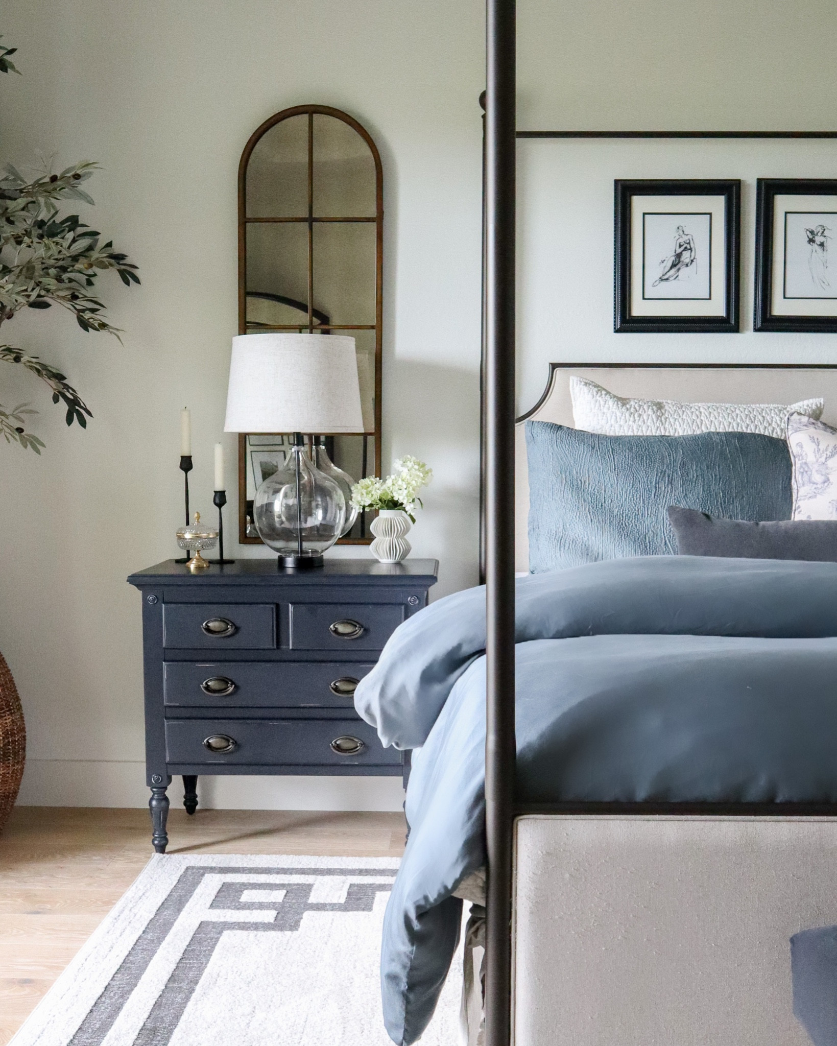 Nightstands styled with arch mirrors and simple, budget friendly decor in my bedroom!

lamp, canopy bed, duvet cover, candleholders, vase, shams, artwork

#LTKhome #LTKstyletip #LTKunder50