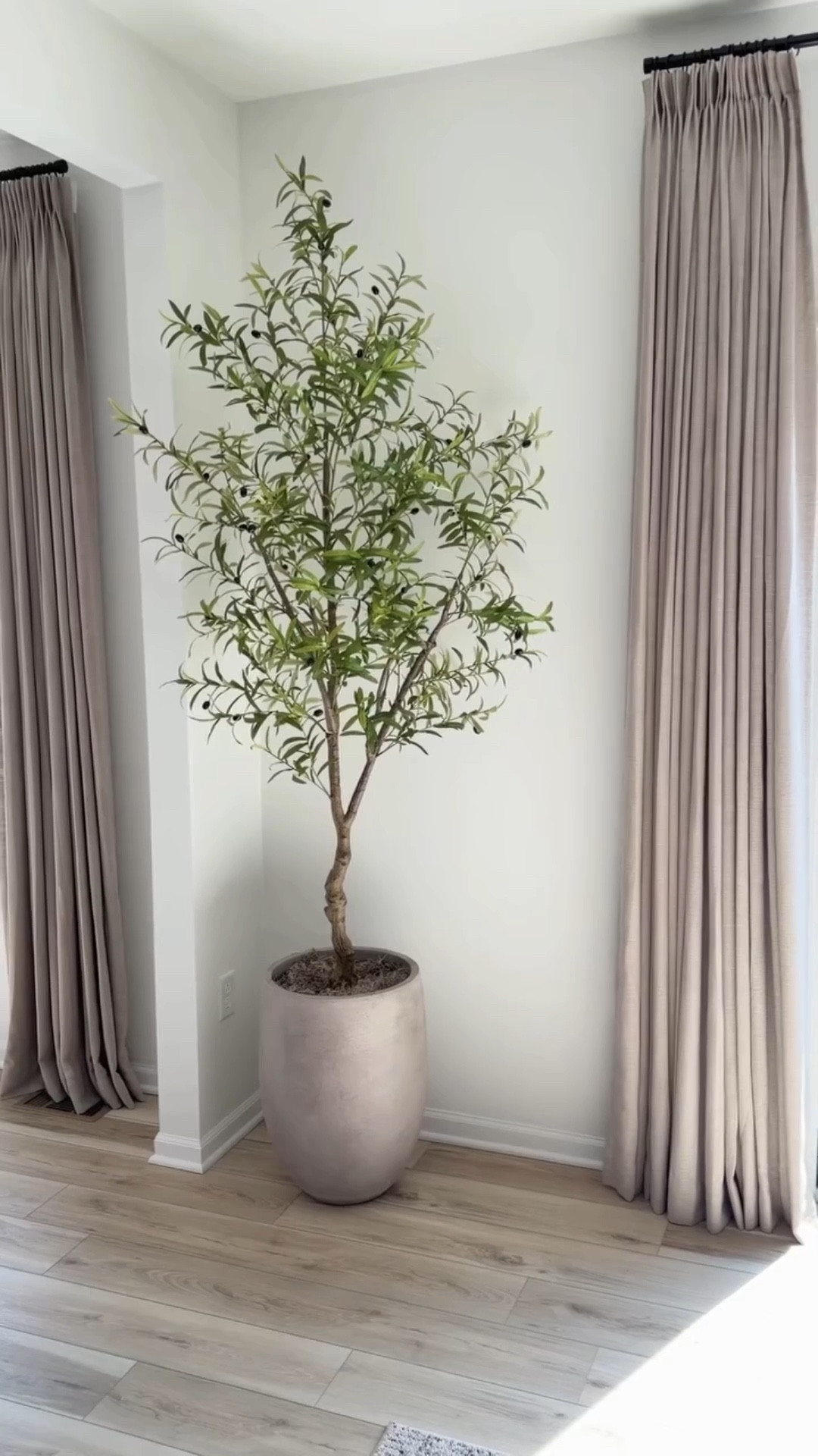 An easy way to decorate an empty corner AND with all Amazon home finds! 🙌🏡 This faux olive tree looks so real and the large concrete planter makes it look so high end! ✨😍

#LTKHome #LTKSaleAlert