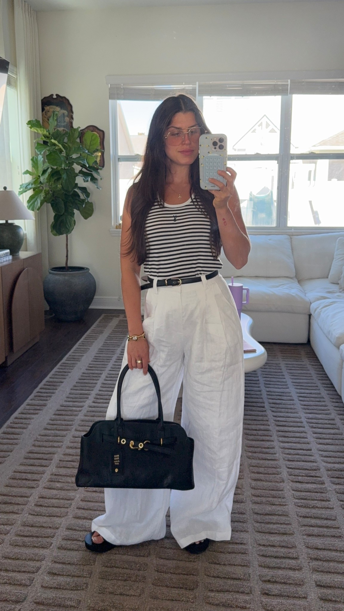 4 in pants | tank and bag are from @bagtrendz_1 | watch and bracelet from @watchtrendz.us