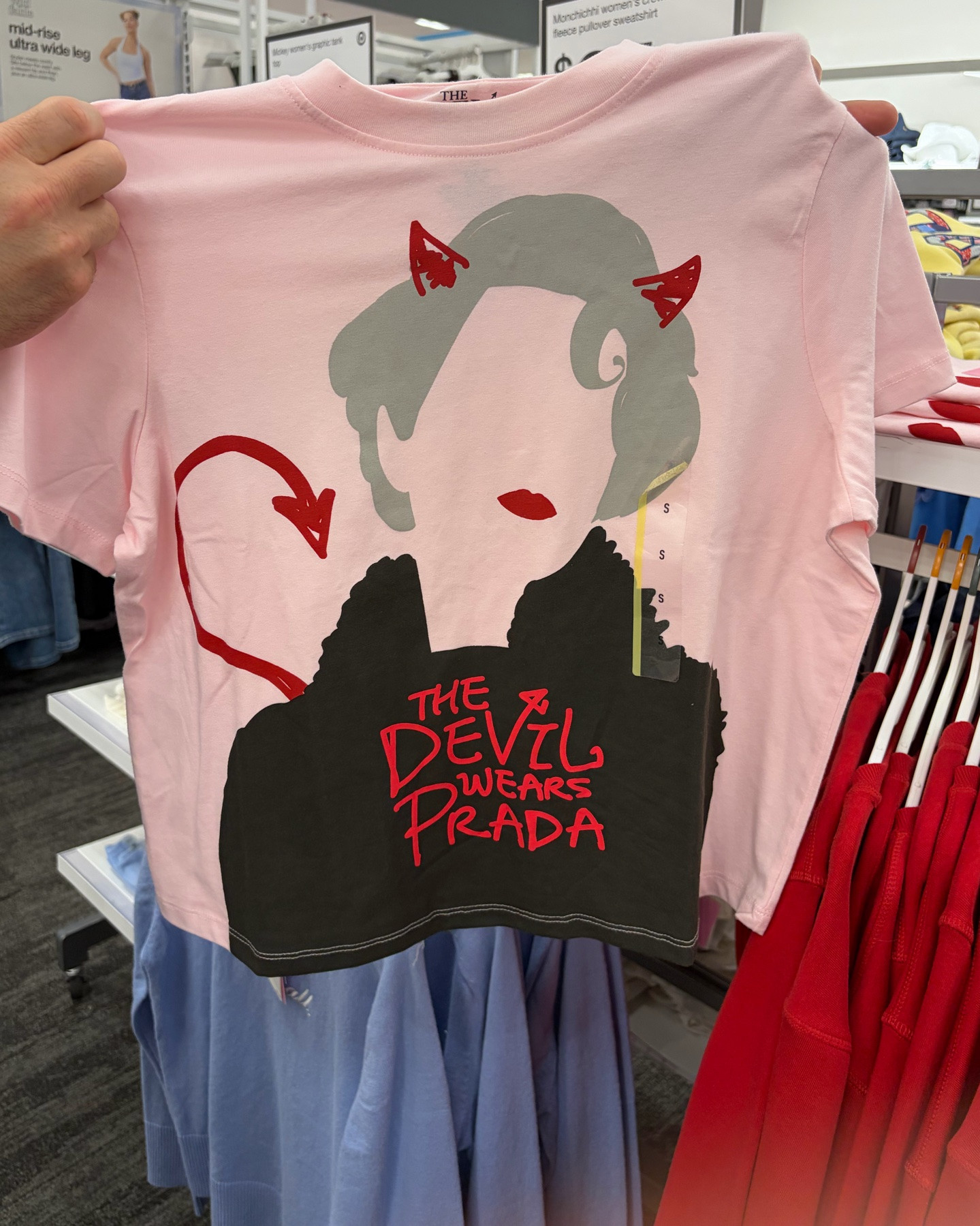 I found this fun pink The Devil Wears Prada Miranda Short Sleeve Graphic T-Shirt on my Target run today!  This cute women’s tee is made from lightweight cotton-polyester fabric, which means it’s comfortable and washes well!