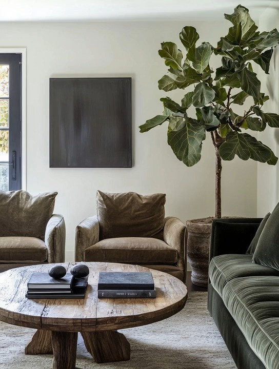 Three Pieces. One Intentional Living Room Refresh.

A round wooden coffee table.
A sage green velvet sofa.
A bold, beautiful fiddle leaf fig.

That’s it.

These three elements instantly shift your space into the era of confident self-expression and mid-century beauty.

• Wood grounds the room with warmth and stability.
• Velvet in sage green adds softness, richness, and cool elegance.
• A large leafy plant brings life, movement, and organic energy.

Round shapes soften the space.
Natural textures calm the eye.
Deep green balances warm wood tones.

It’s the perfect harmony of:
Warm and cool.
Soft and structured.
Yin and yang.

You don’t need ten new pieces.
You need the right three.

Grounded. Intentional. Effortlessly bold. 

 #LTKHome