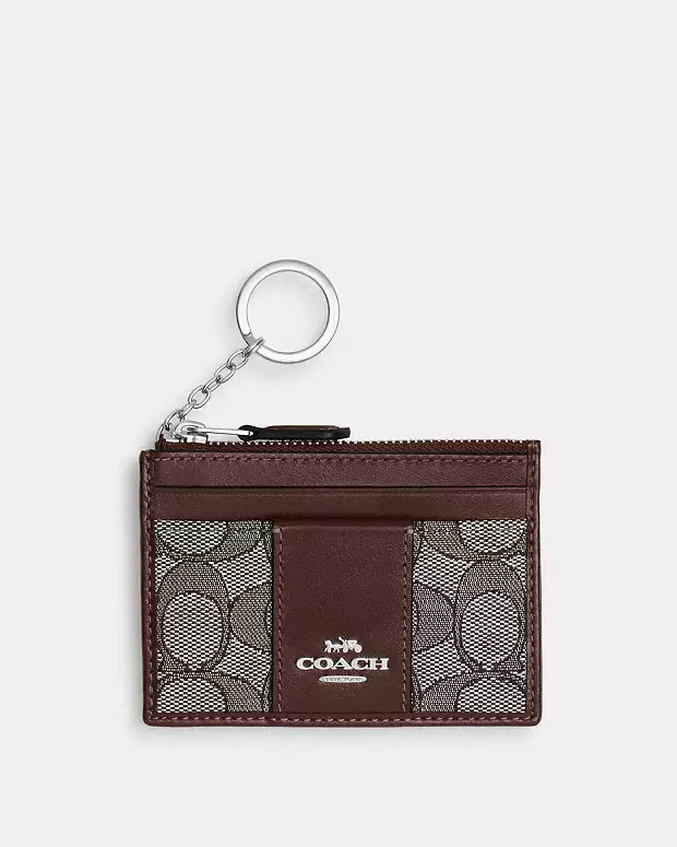 Mini Id Skinny In Signature JacquardRating4.8$39(56% off)Comparable Value$88Color: Silver/Oak/Map... | Coach Outlet US