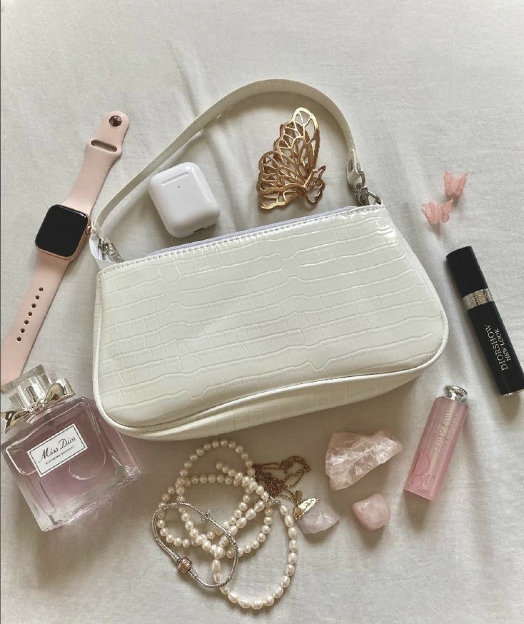 What in my bag for the aesthetic it girl. It giving clean girl pink Pilates princess Pinterest vibes. Everyday essentials.

#LTKbeauty #LTKSeasonal #LTKunder50