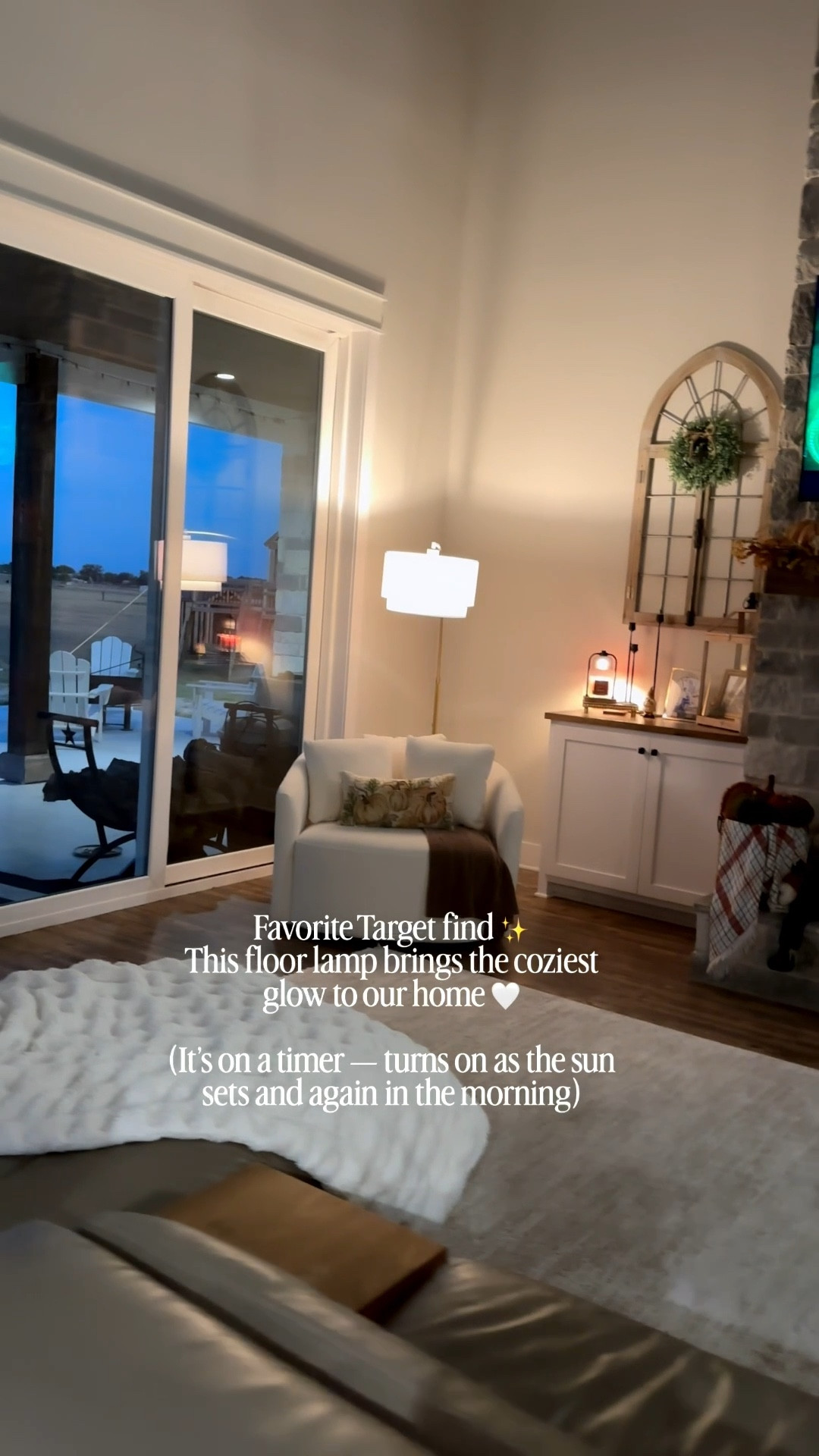 The coziest lighting! My favorite time of day and my favorite home find from Target. 💡🌅 

#chair #floorlamp #livingroom #homedecor #eveningviews 

#LTKFindsUnder100 #LTKFamily #LTKHome