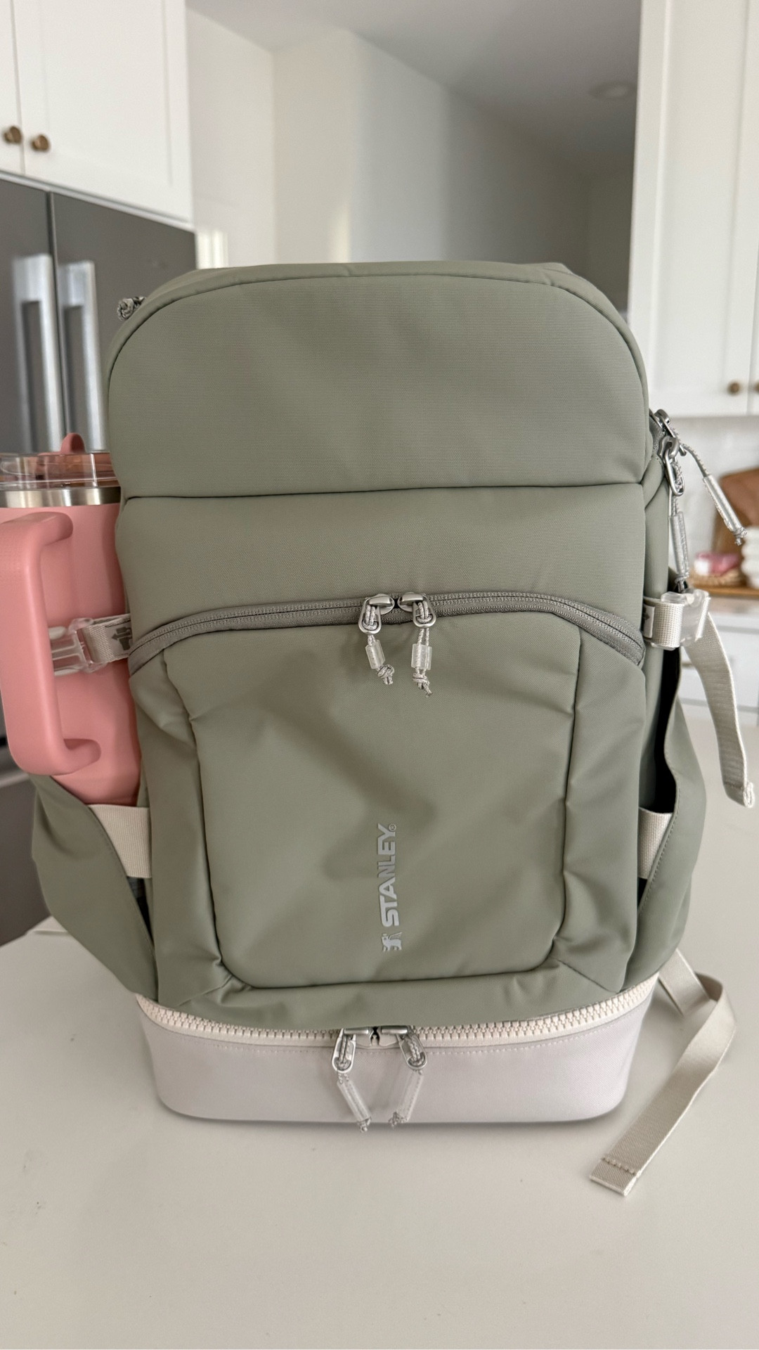 #ad The NEW Vitalize backpack by Stanley is impressive! The material is easy to wipe down, it’s got great zippered pockets, a laptop sleeve, a spot for a waterbottle on the inside of the bag, an expandable bottom compartment that’s great for shoes, and two exterior pockets with belts that hold and secure my 40oz Stanley tumblers! I’ll be using this for travel, long sports days, the gym, and outings with my kids. It could even work great as a diaper bag!

@stanley_brand #stanleypartner @Shop.LTK #liketkit 

#LTKdayinmylife #LTKfitnessgoals #LTKmomlife