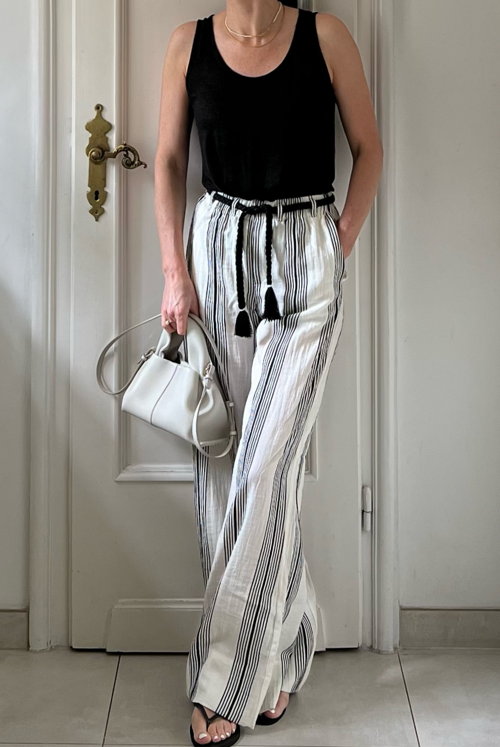 Summer outfit, striped trousers, linen blend trousers, white leather bag, flip flops

#LTKsummer #LTKuk #LTKeurope