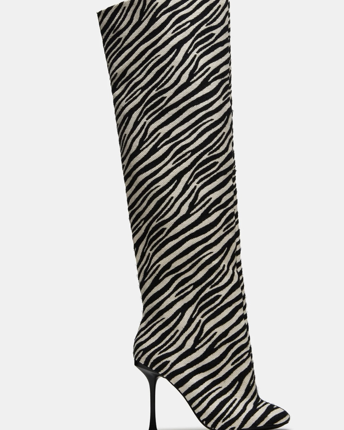 Steve Madden Print Boots. Comes in multiple colors & textures. 

#LTKSeasonal #LTKStyleTip