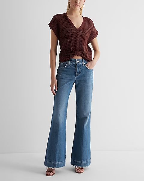 Mid Rise Medium Wash Raw Hem 70s Flare Jeans | Express