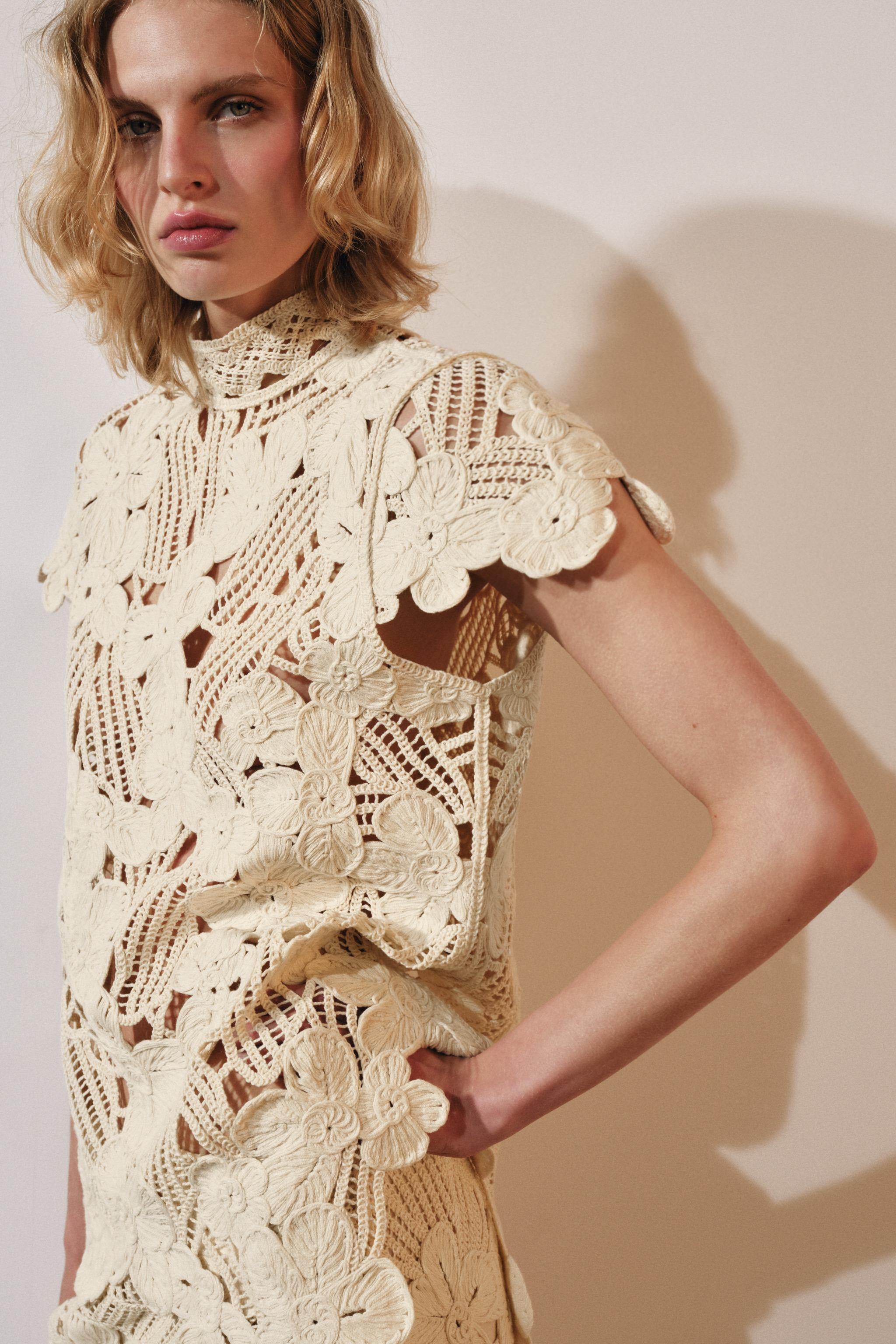 DescriptionCompositionMeasurementsZARA WOMAN COLLECTIONTop made from a cotton blend yarn. Featuri... | Zara UK