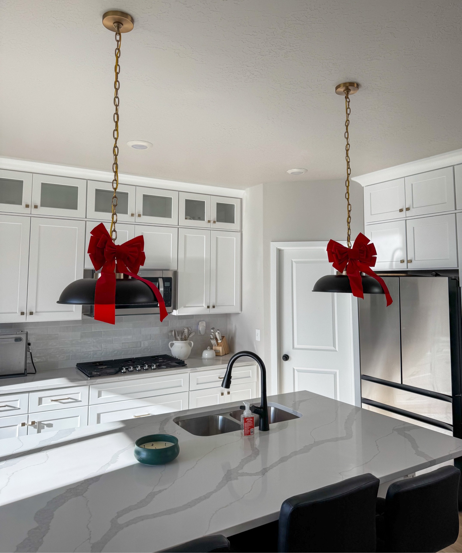 The cutest red bows to place on lighting!!

#LTKSeasonal