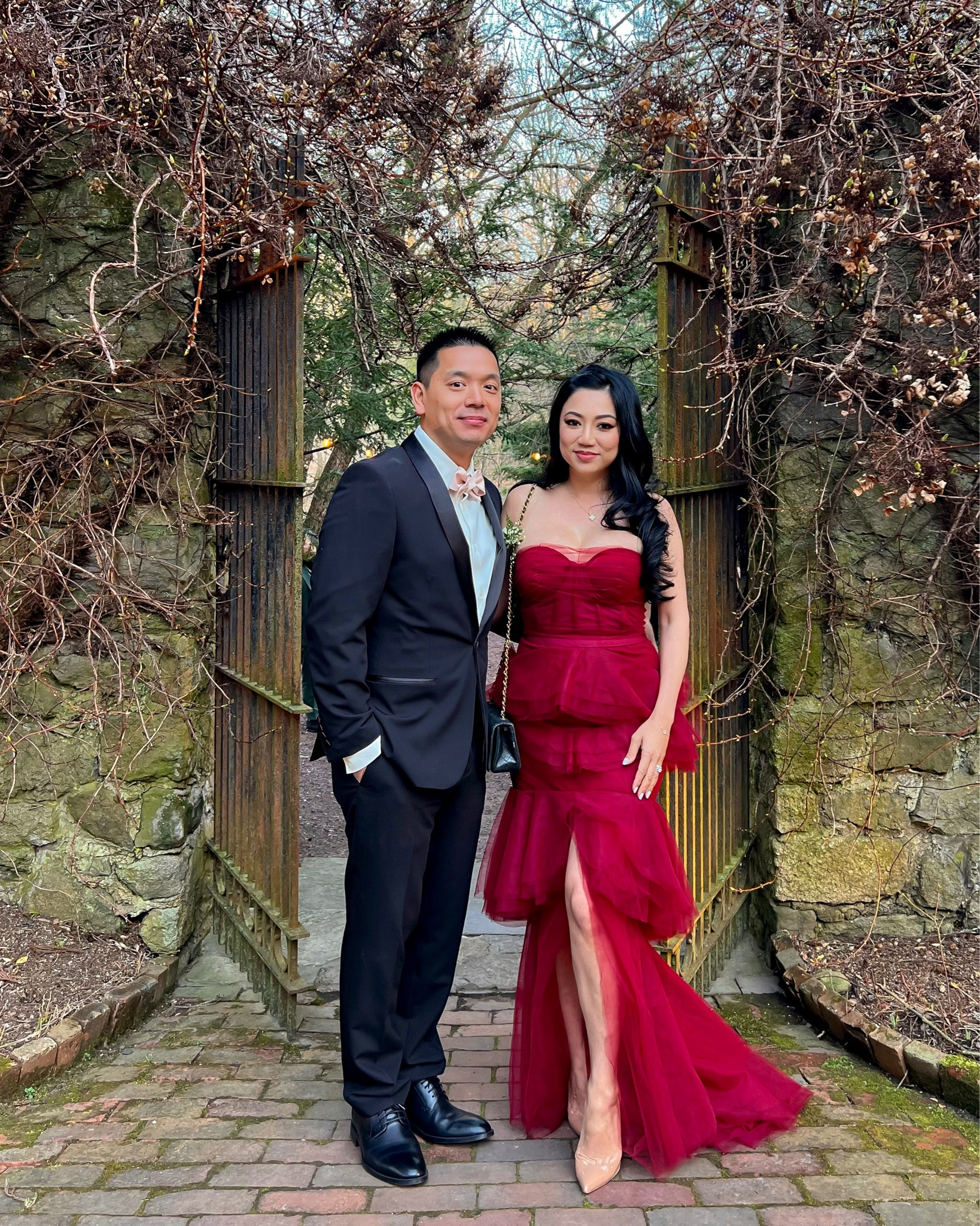 Alai Gown by Michael Costello // Elegant strapless dress featuring a boned bodice, tulle fabric throughout with a high low hem and tiered ruffles. The color is a beautiful and rich oxblood red. Perfect as a wedding guest dress or to any black tie event. I’m wearing size small.

#LTKGala #LTKwedding #LTKparties