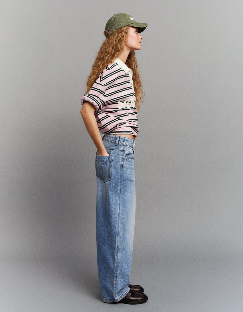 Low-rise wide-leg barrel jeans with front buttons - Women | Bershka UK