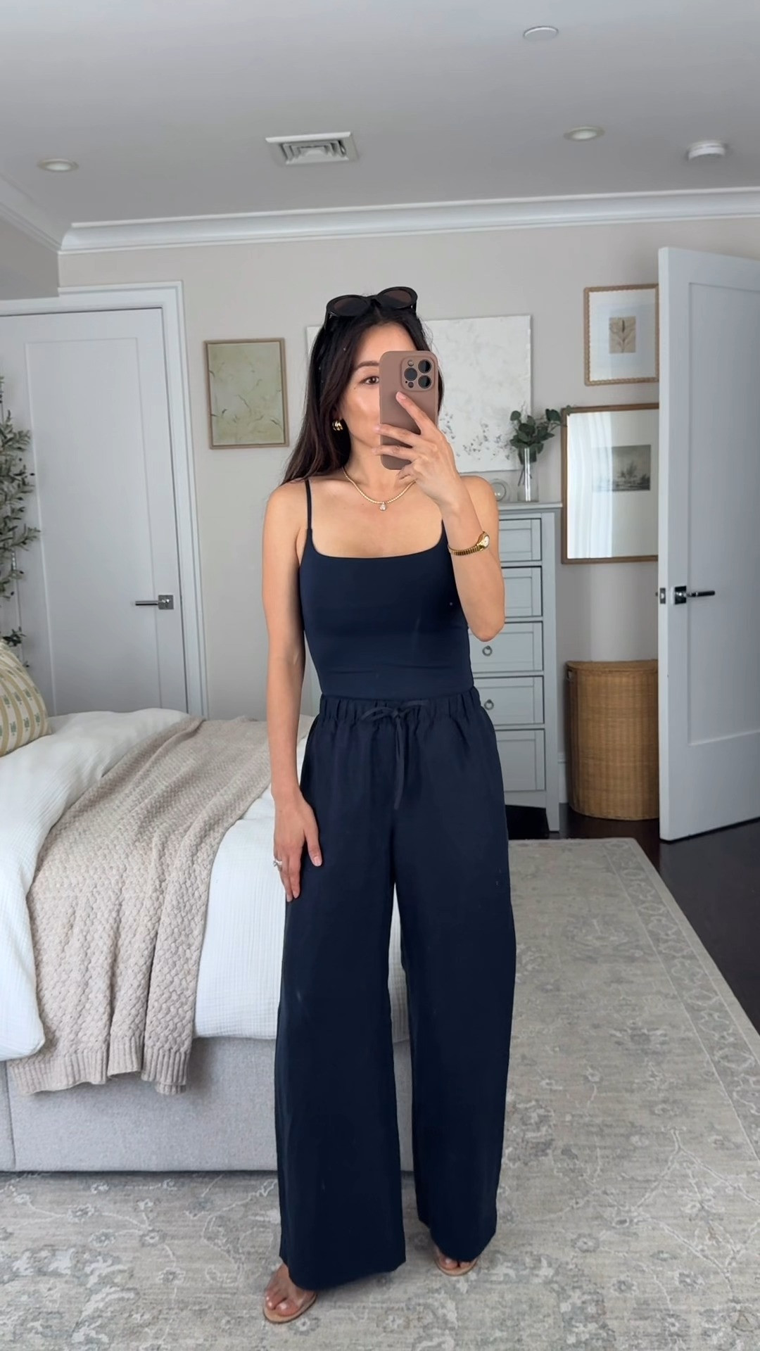 One of my top summer pants and a great sleek cami. Lodge linen blend in 2XS Short, Cami XS (sized up). Inseam is about 27.75” on my pants and shrinks a bit if you machine dry. Cami is form fitting and comes in 2 length options - regular or a shorter waist-length if you don’t want to tuck it in! 
@aritzia #aritziapartner

#LTKootd #LTKPetite