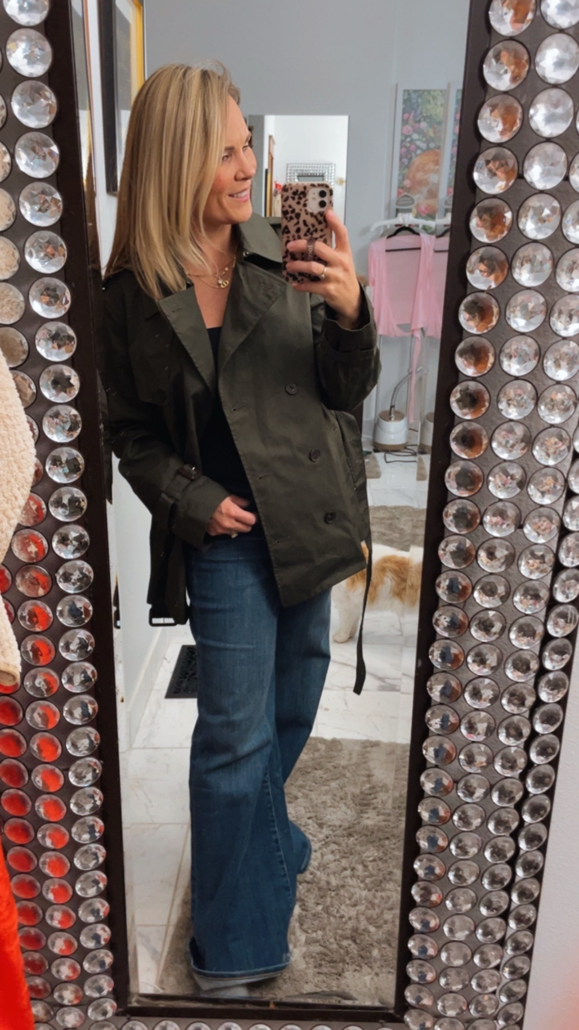 This outfit is the perfect mix of **classic pieces with a fresh pop of color** 💚

The green trench coat instantly makes a statement while still feeling timeless and polished. It’s one of those outerwear pieces that elevates even the simplest outfit the moment you put it on. Layered over an Aritiza black top, the look feels cozy, refined, and effortlessly put together — the kind of combination that works for everyday wear but still looks elevated.

The wide-leg jeans add a modern touch while keeping the outfit comfortable and relaxed. I love how the structured shape balances the softness of the sweater and the tailored feel of the trench. It’s a great example of mixing classic staples with updated silhouettes.

Finished with brown suede loafers, the outfit feels warm, neutral, and cohesive. The suede texture adds a subtle richness that ties everything together beautifully. This is the kind of outfit that works for coffee dates, casual meetings, errands, or travel days when you want to feel polished but still comfortable.

Simple, classic, and effortlessly chic — proof that great basics always make the best outfits. 🤍

**Keywords:** trench coat outfit, Aritzia trench coat, J.Crew cashmere sweater, wide leg jeans outfit, casual chic outfit, neutral outfit ideas, classic everyday style, effortless fashion, capsule wardrobe, elevated basics, timeless outfit
#LTKunboxing #LTKspringtrends

#LTKTravel