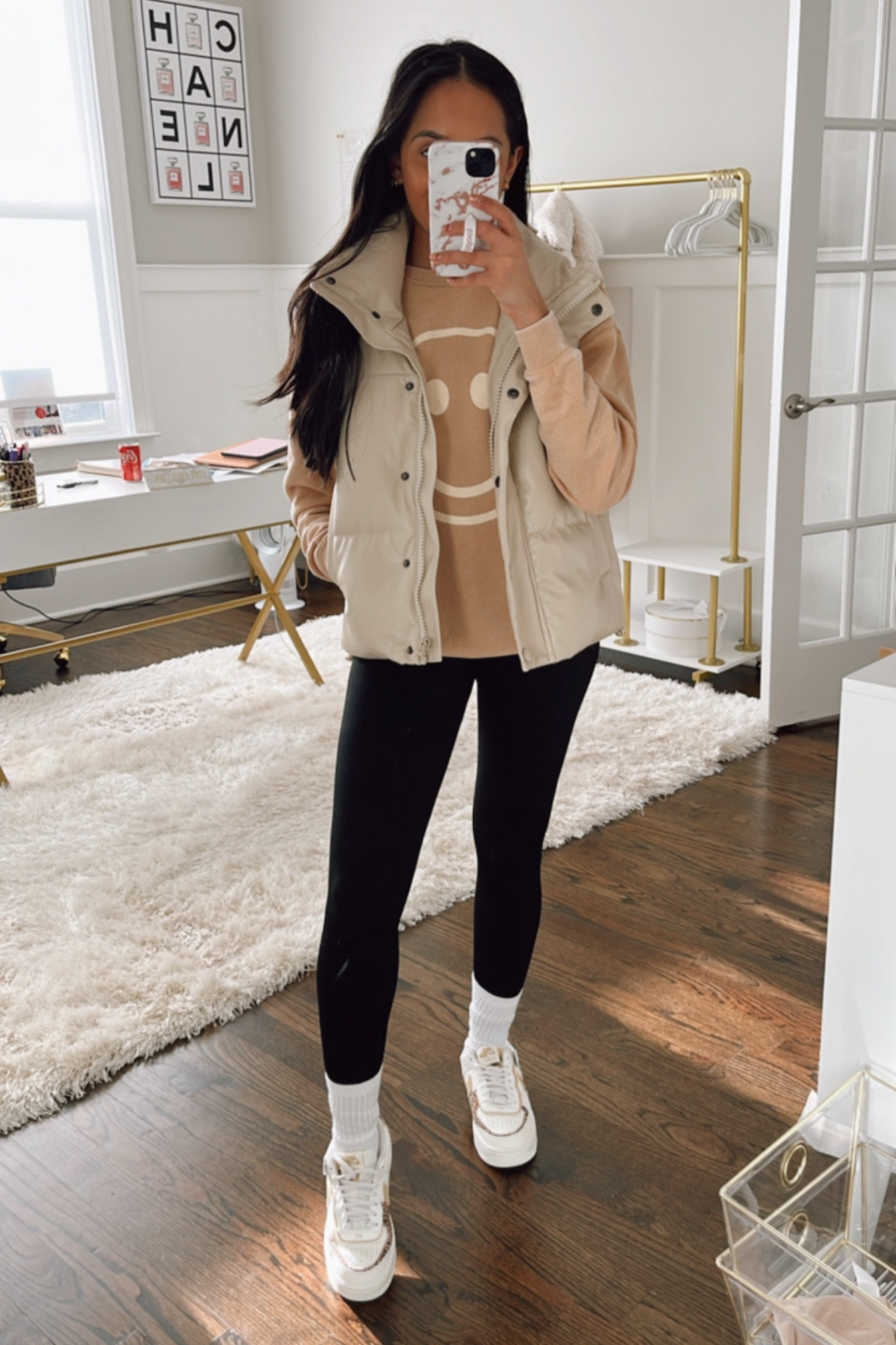 Leather puffer vest
Nikes
Vest outfit 