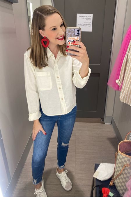 All the heart eyes over this darling button front shirt at Target! Paired with jeans and sneakers makes for the cutest spring outfit idea!! Universal thread tops at Target! Spring shirts at Target!! 