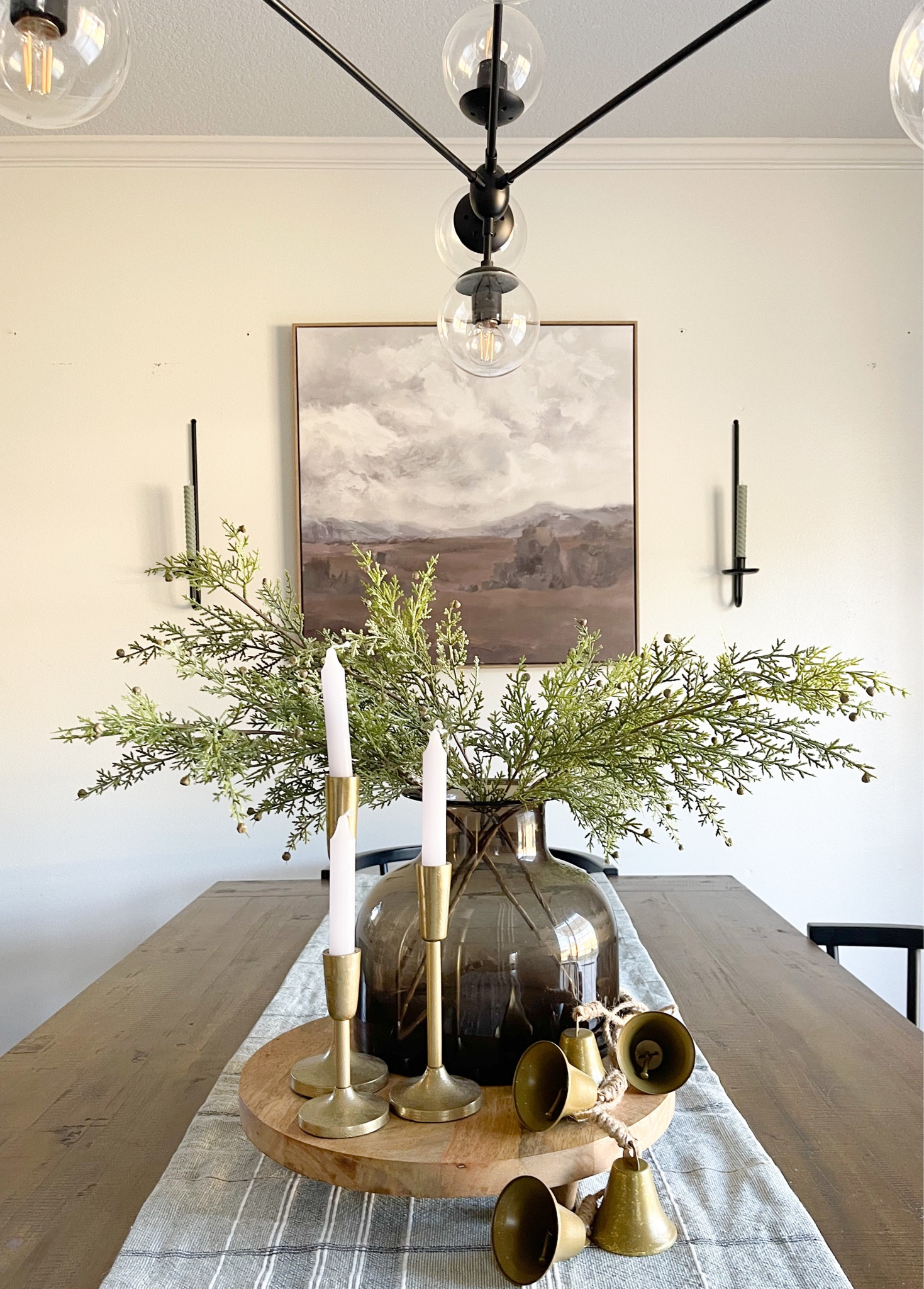 Winter table decor. Diningroom. Christmas centerpiece. Holiday decor. Dining table. Studio mcgee style. Gold candlestick holder. Gold bells. Centerpiece ideas. 

#LTKhome #LTKstyletip #LTKHoliday