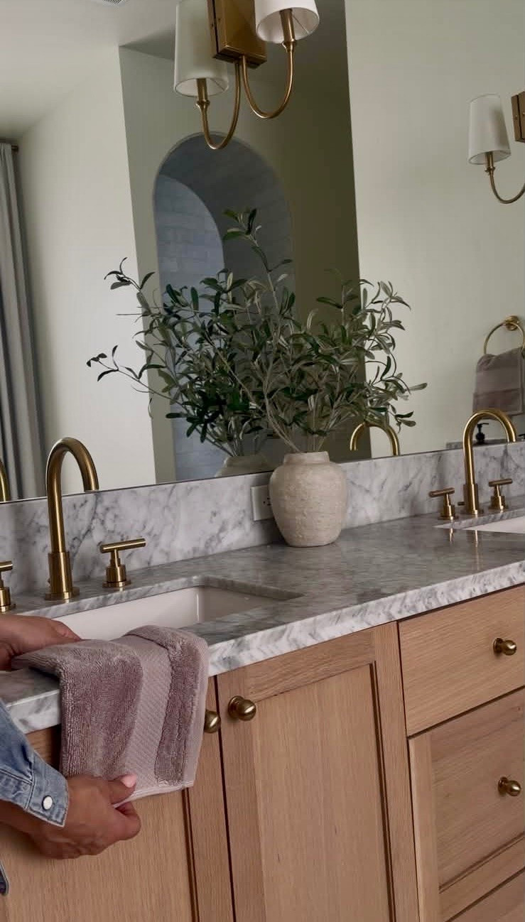 I’m linking the hand towels and bathroom accessories that make this space feel polished without spending a fortune. Small details like soft textiles, warm brass finishes, and natural textures can completely change the look of a bathroom.

I love choosing pieces that are both practical and beautiful. These are the everyday essentials I reach for when I want a bathroom to feel a little more elevated and spa-like. Shop all of my favorites here.
@Wayfair 
@lowes 

 #LTKU #LTKHome #LTKSaleAlert