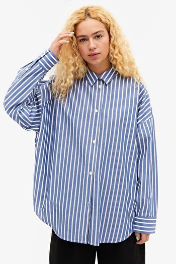 Blue stripe oversized cotton shirt
                  			£35 | Monki