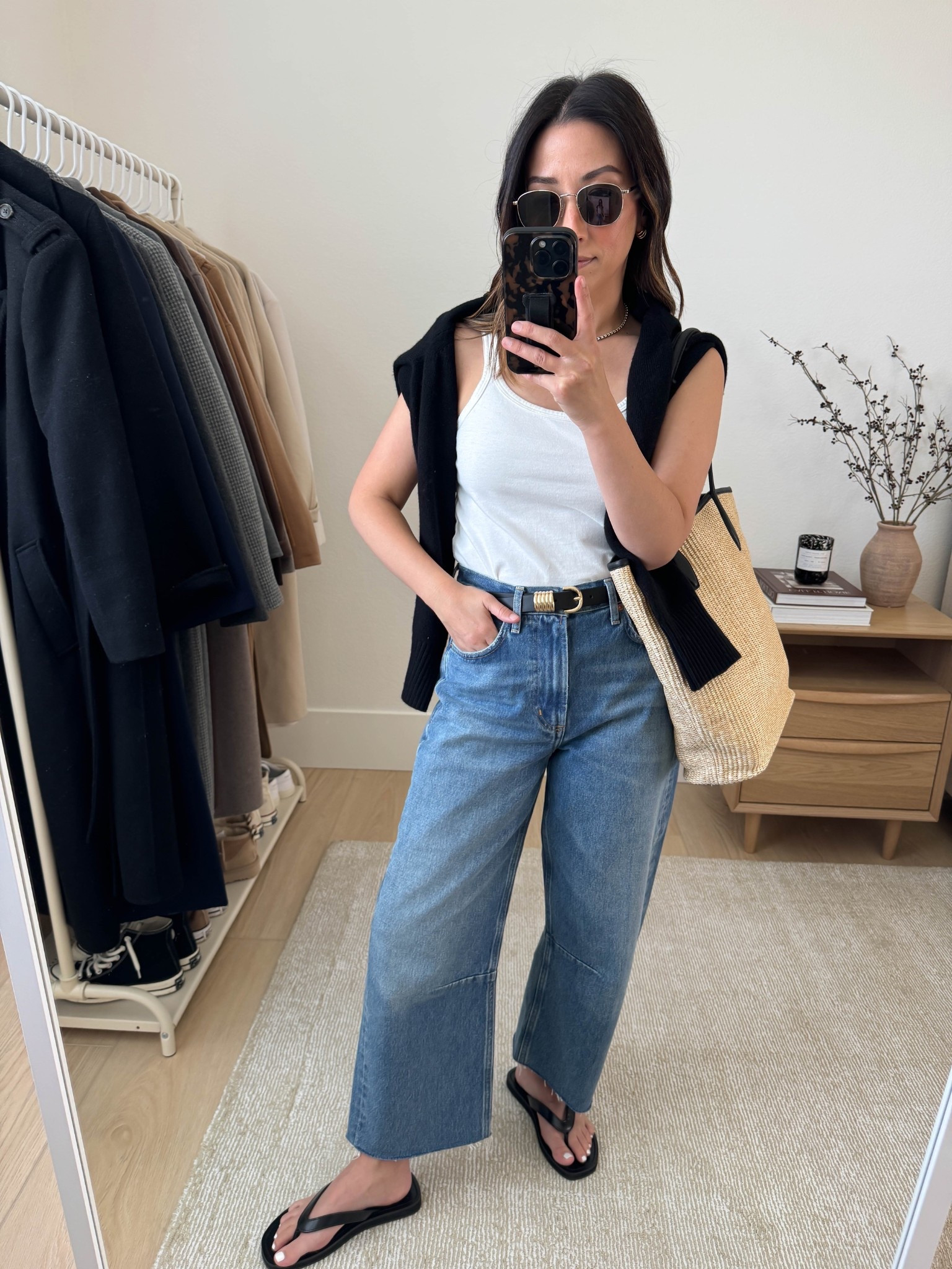 How to wear tank tops and jeans this summer. Bring your tank and denim outfits to 2025. Tank is old Reformation, but it's a good one! I did find a new scoop neck that is so flattering that I'll link. Not a spaghetti strap, but it's for the better. Jeans have a slight curve, which is great if you don't want to dive deep into barrel jeans. 

Reformation tank small (old)
Citizens of Humanity Miro jeans 25. Cut hems
J.Crew sandals 5
Madewell tote (old)
Everlane sweater xs cashmere is sold out, linking the cotton one
Le Specs sunglasses 
Good American belt
J.Crew earrings
Dorsey James necklace 15"

#LTKStyleTip #LTKPetite #LTKItBag