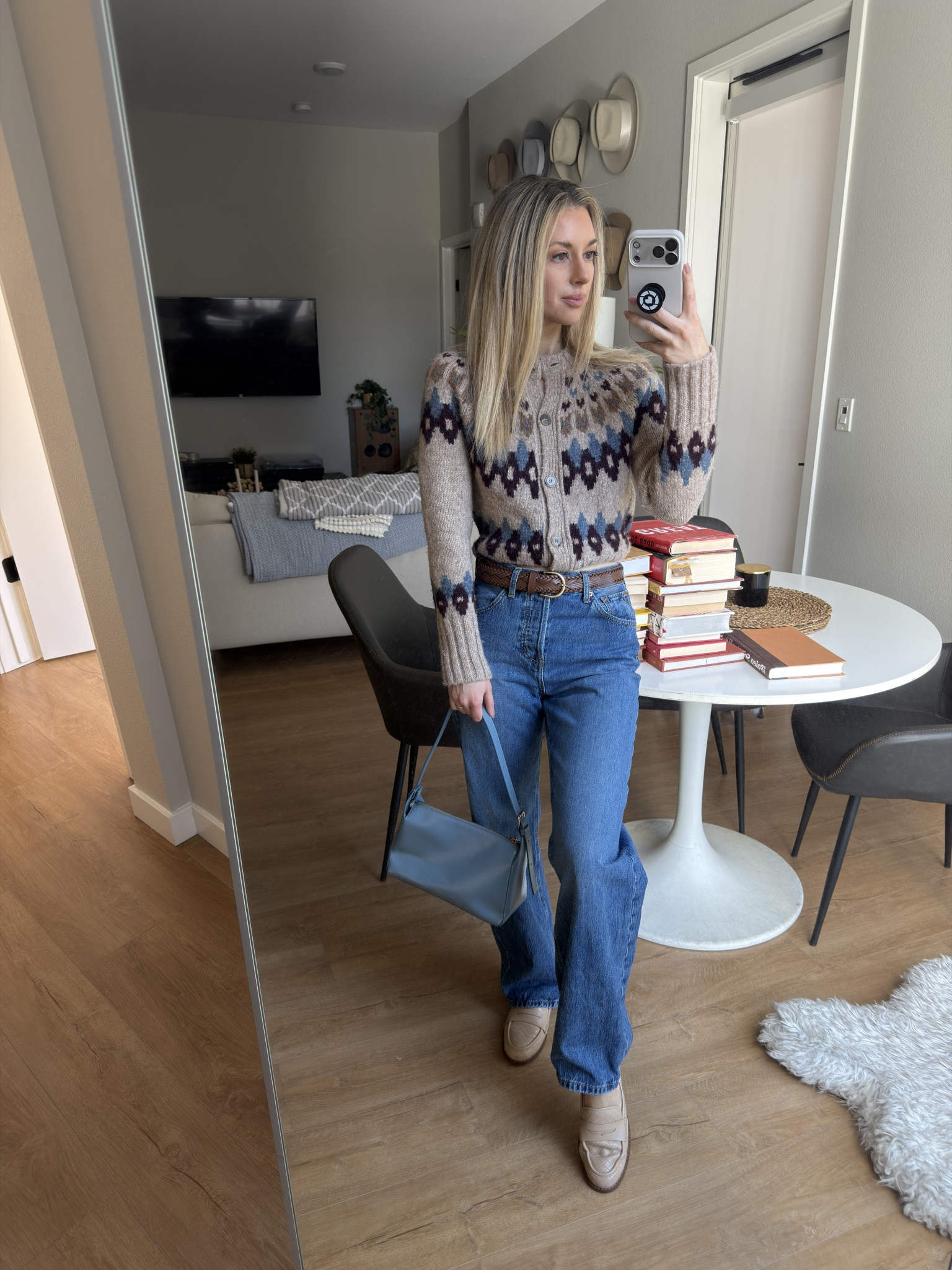Neutral everyday outfit featuring a patterned knit sweater, straight leg jeans, classic leather loafers, and a structured handbag. This is one of my favorite effortless outfit formulas for fall or early spring. Polished, comfortable, and easy to recreate. Linking my sweater, denim, loafers.

#LTKootd