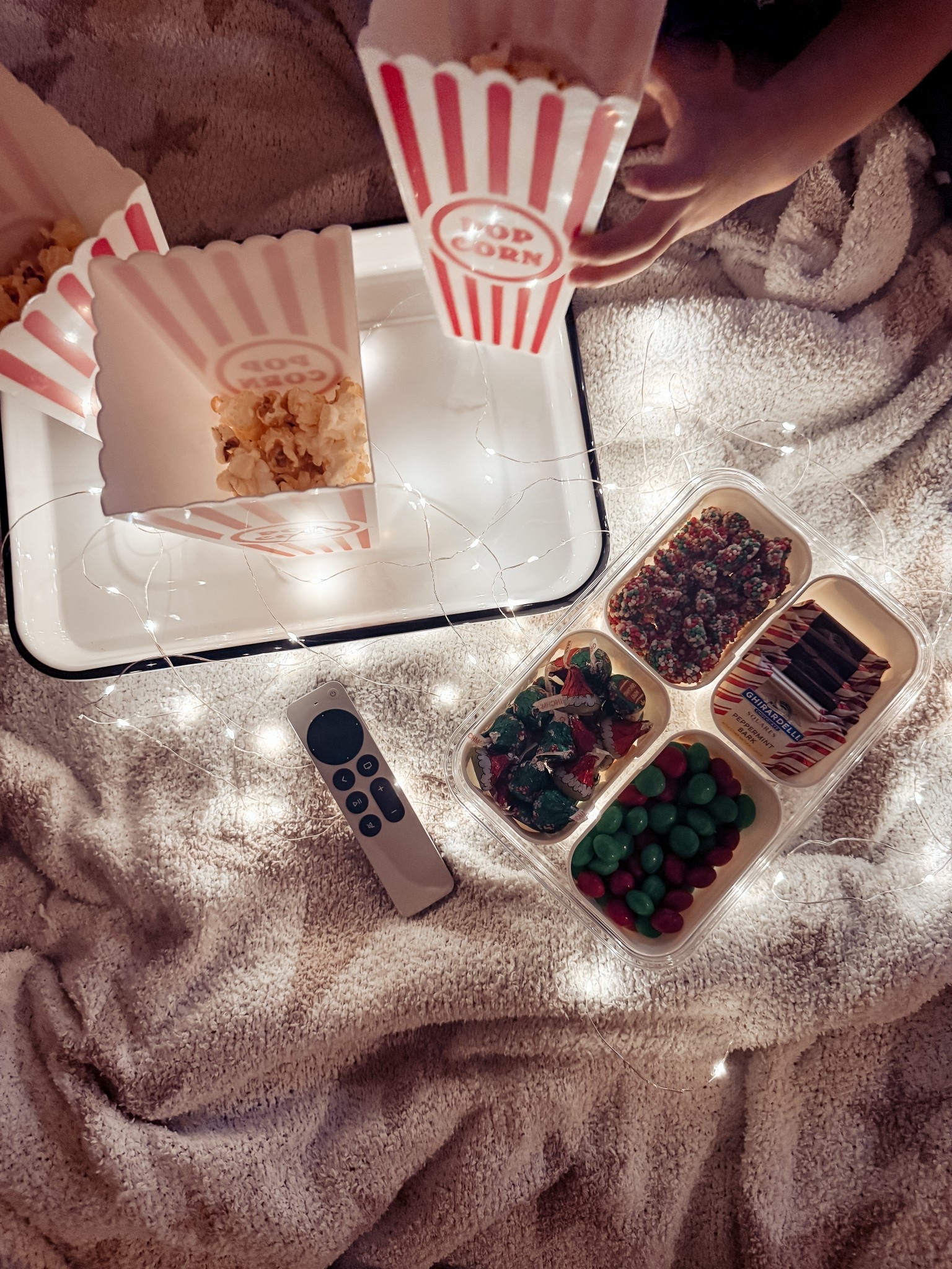 { christmas movie night ❥ 

Small Snackle Box . Christmas Candy Treat Box . Red and White Striped Popcorn Containers . Twinkle Lights . Apple TV } 

#LTKHoliday #LTKFindsUnder50 #LTKHome