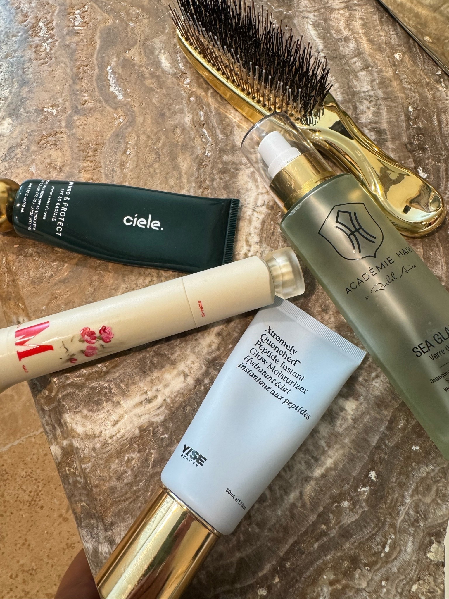 In the mix today 💎
(1) This new YISE moisturizer delivers major hydration without feeling heavy and rivals one of my favorite $300+ formulas 
(2) I love the SPF and luminosity of this Ciele primer. It’s my first step after skin care every day.
(3) The Metacine Eye Lift banishes puffiness while giving eyes you lifted, look with every application. 
(4) Sea Glass for the softest and silkiest tangle free hair with zero weigh down. Never want to be without this!
(5) This Maya Chia brush smooths snarls and leaves hair extra shiny

#LTKdayinmylife #LTKgrwm #LTKBeauty