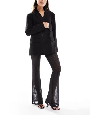 ASOS DESIGN hot fix sheer mesh flare trouser in black | ASOS | ASOS (Global)