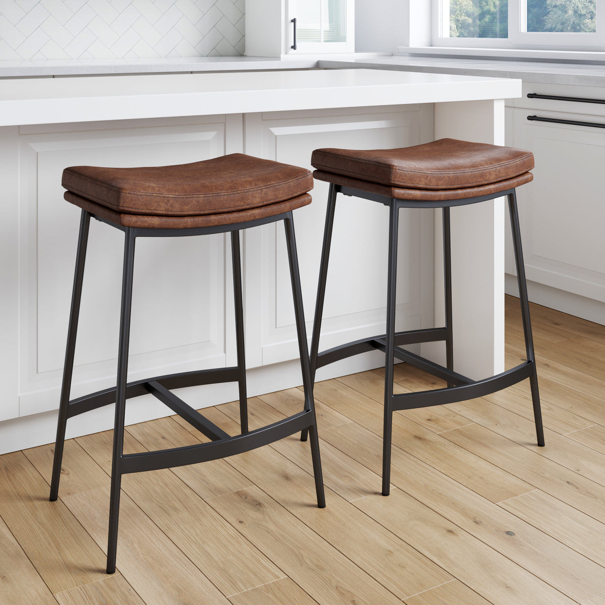 Faux leather counter height stools 

We love these sleek, easy to clean faux leather stools. @Nathan James

#LTKU #LTKSaleAlert #LTKHome