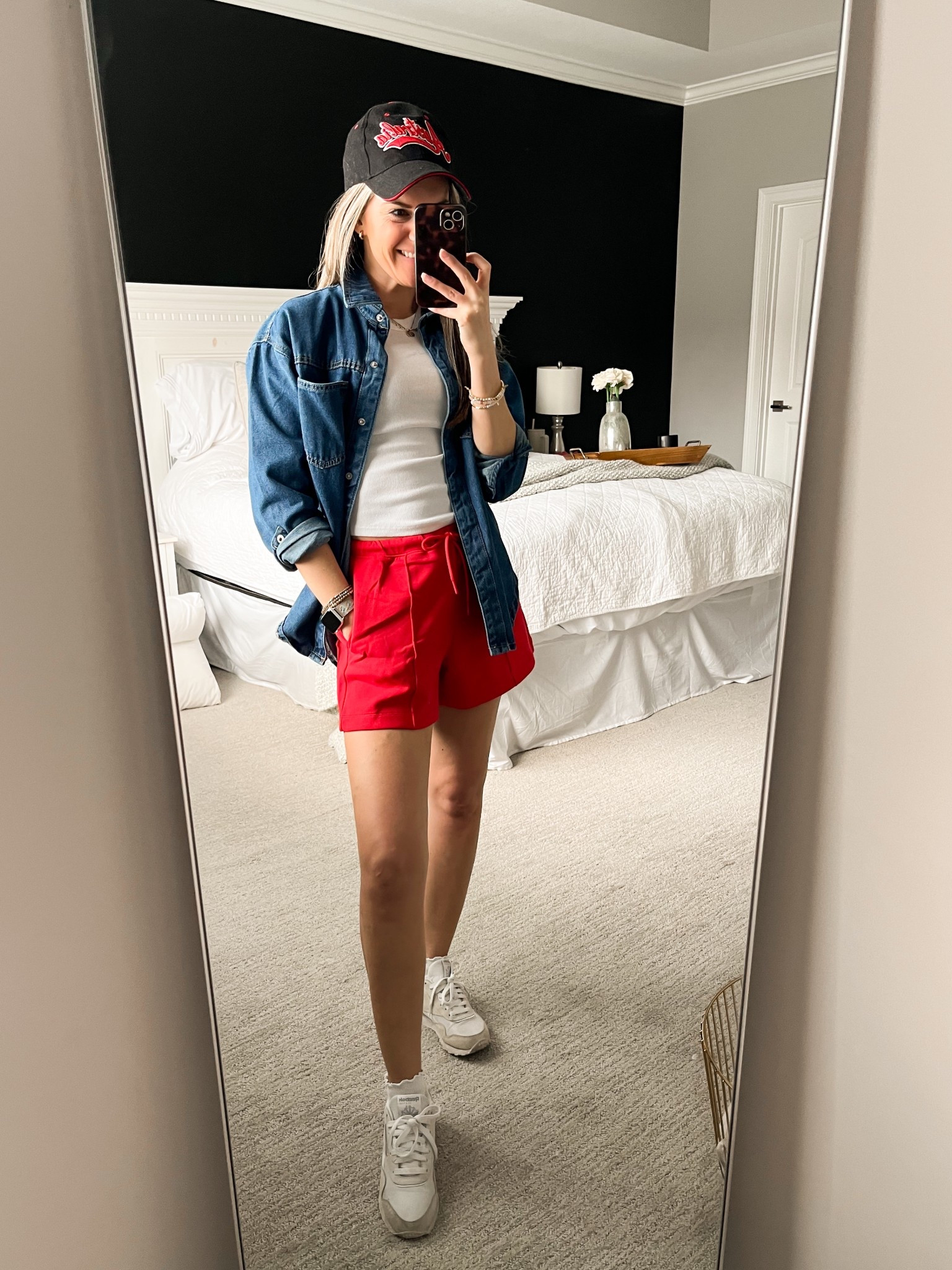 Copy this look for your errands, kids sporting events and spring school pick up!

Small tank, XS shorts

Old navy outfit, soccer mom, errands outfit, baseball hat outfit, spring outfit, spring outfit 2026, athletic shorts, red shorts, cherry red, white sneakers outfit, sports mom outfit, causal outfit idea, denim jacket, ruffle socks

#LTKSaleAlert #LTKmomlife #LTKActive