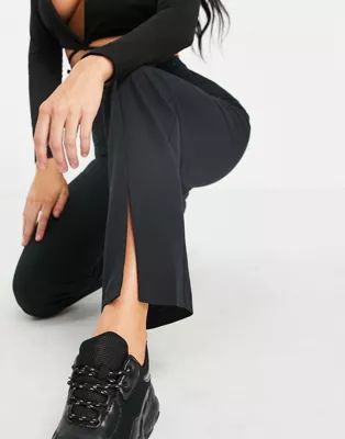 ASOS DESIGN Hourglass loose slim leg trouser with split front in black | ASOS (Global)