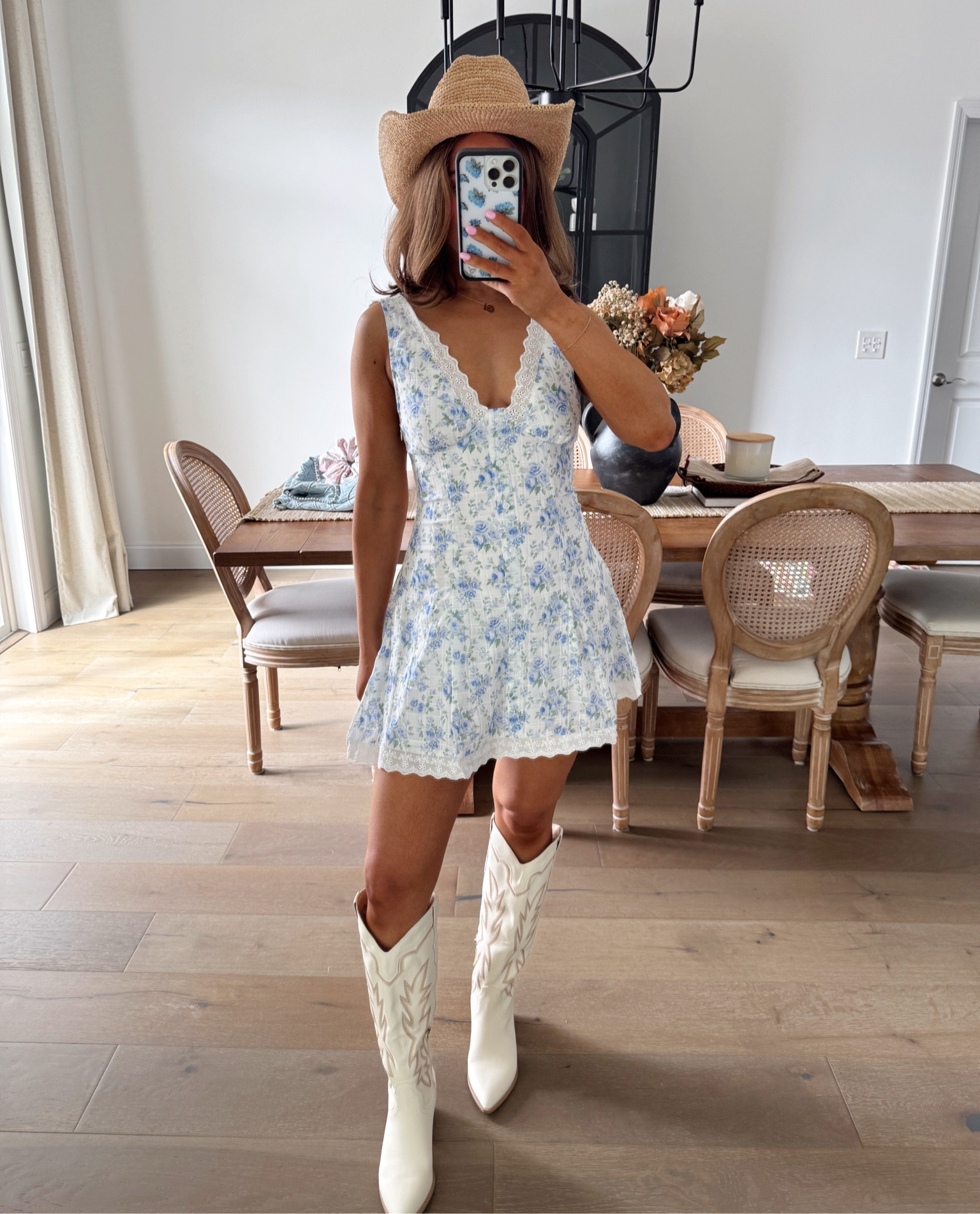 Twirl-ready in this white and blue floral beauty and cowgirl boots — perfect for dancing under the stars at any country concert 

#LTKSeasonal #LTKParties #LTKStyleTip