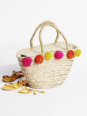 Poms All Around Straw Tote by Gracie Roberts at Free People | Free People