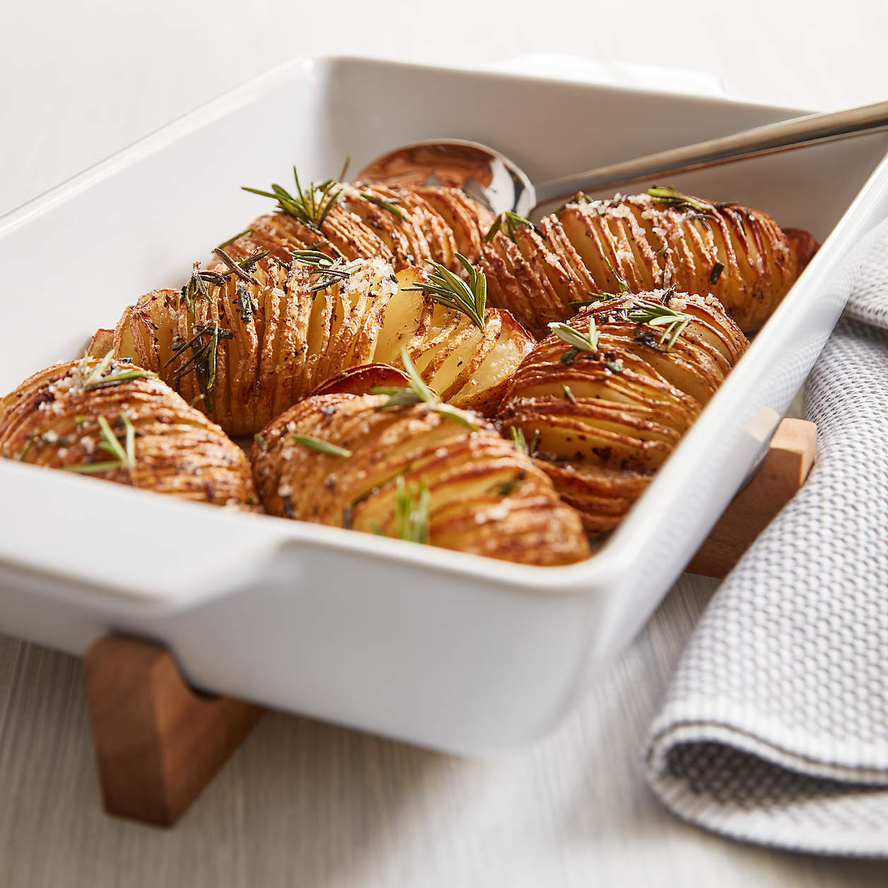 Oven-to-Table Rectangle Baking Dish with Wood Trivet + Reviews | Crate & Barrel | Crate & Barrel