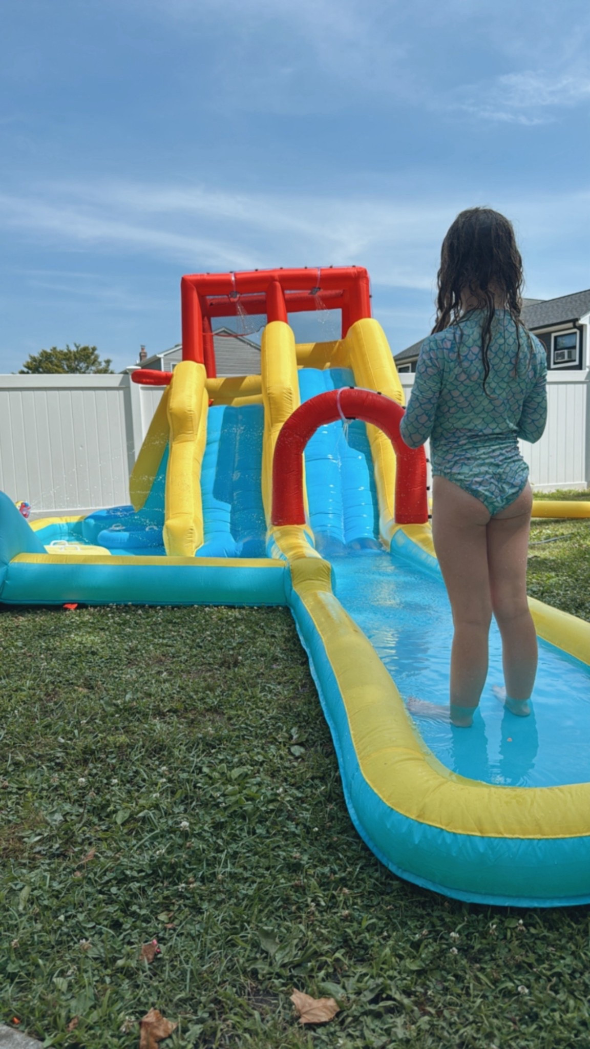 The best backyard water slide!!! This blow up water slide doubles as a little pool too!! 

#LTKKids #LTKSeasonal