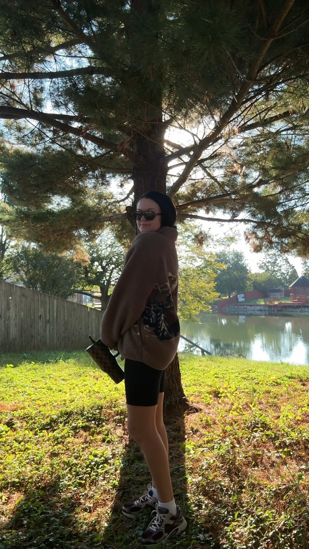 Fall morning walk outfit - old navy Sherpa, biker shorts, Nike shoes, and hydrojug #walks #fallcasualoutfit 