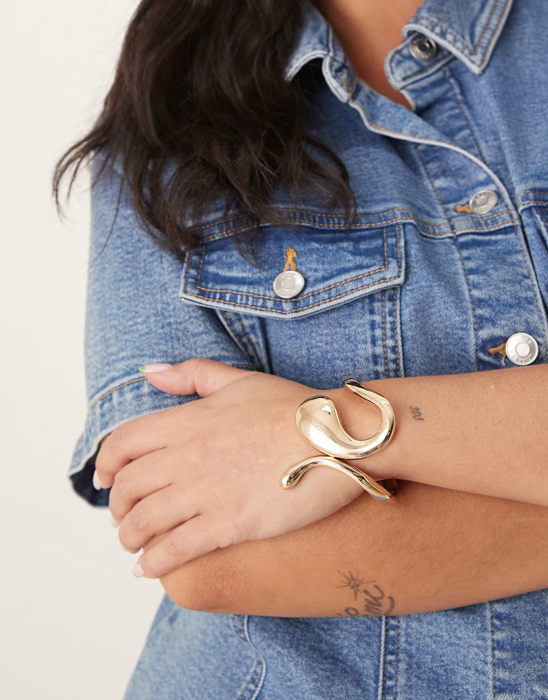 ASOS DESIGN Curve cuff bracelet in molten design in gold tone | ASOS | ASOS (Global)