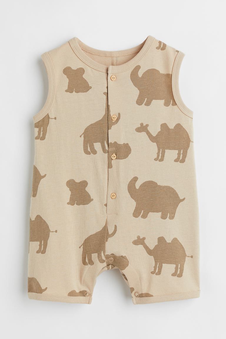 Sleeveless romper suit in soft, printed cotton jersey with buttons down the front, press-studs at... | H&M (US + CA)