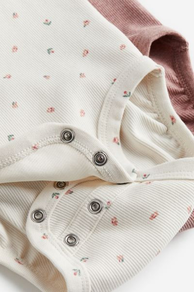 2-pack Ribbed Cotton Bodysuits - Sleeveless - Dusty pink/floral - Kids | H&M US | H&M (US + CA)
