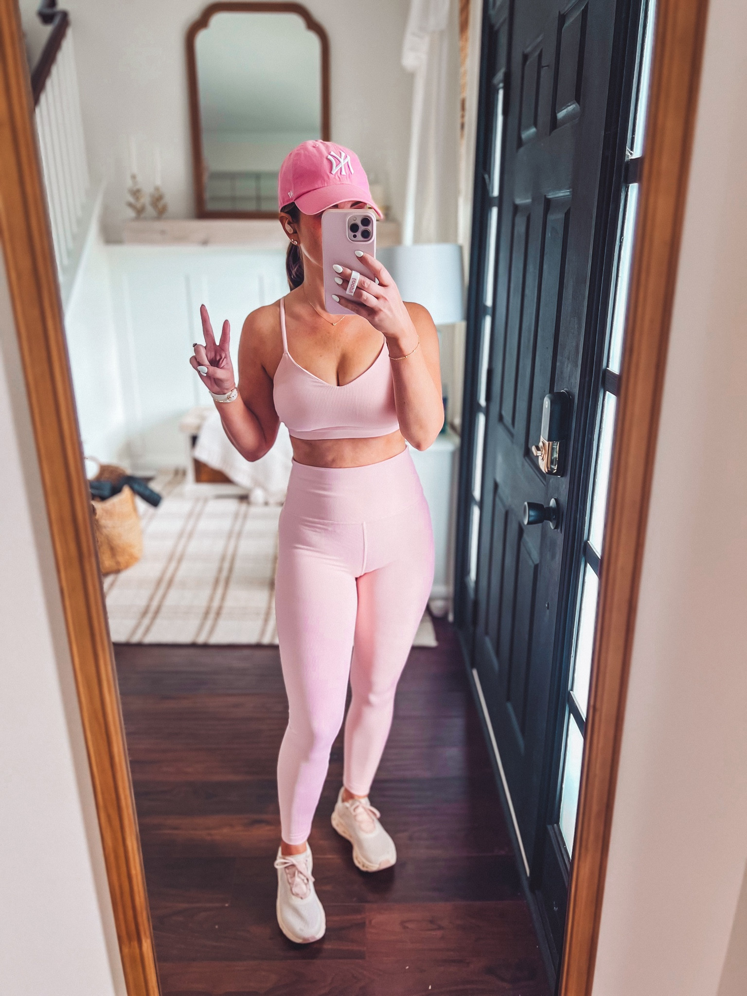Light pink workout set 
Light pink sports bra -small 
Light pink workout leggings-medium 
On Cloudmonster neutral pink sneakers -size up half size 
Pink ball cap hat
White and rose gold Amazfit watch 