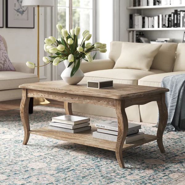 Francoise Solid Wood Coffee Table with Storage | Wayfair North America