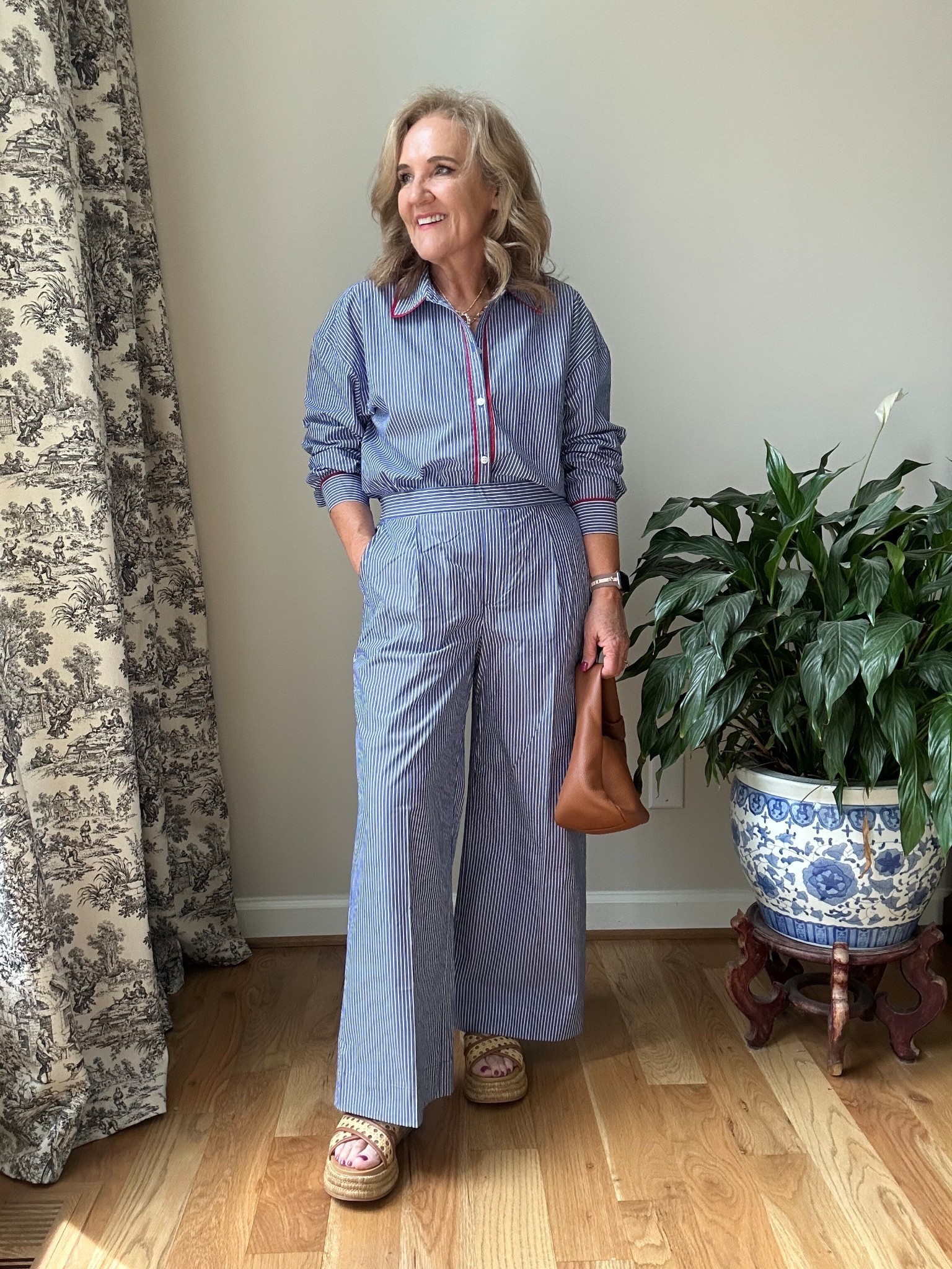 A little preview of this cotton poplin set. Sold separately. The fabric is light and really lovely. And love the red piping. 

I went a large in the blouse for an oversized fit. Medium in the trousers. 

Sandals are true to size. 

Red white blue summer style Tuckernuck striped set 

#LTKShoeCrush #LTKSeasonal #LTKOver40