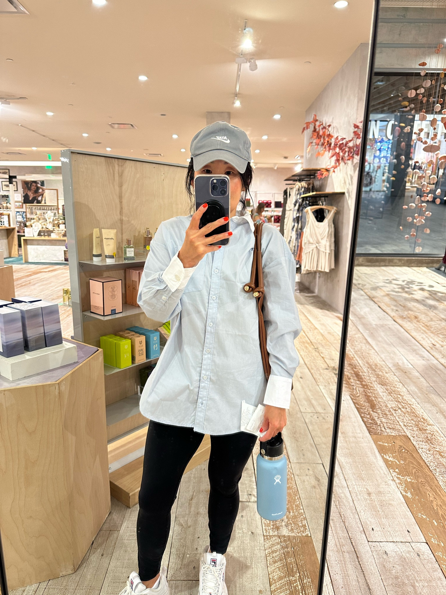 Love this button down shirt! Runs large .. I’m wearing an XXS