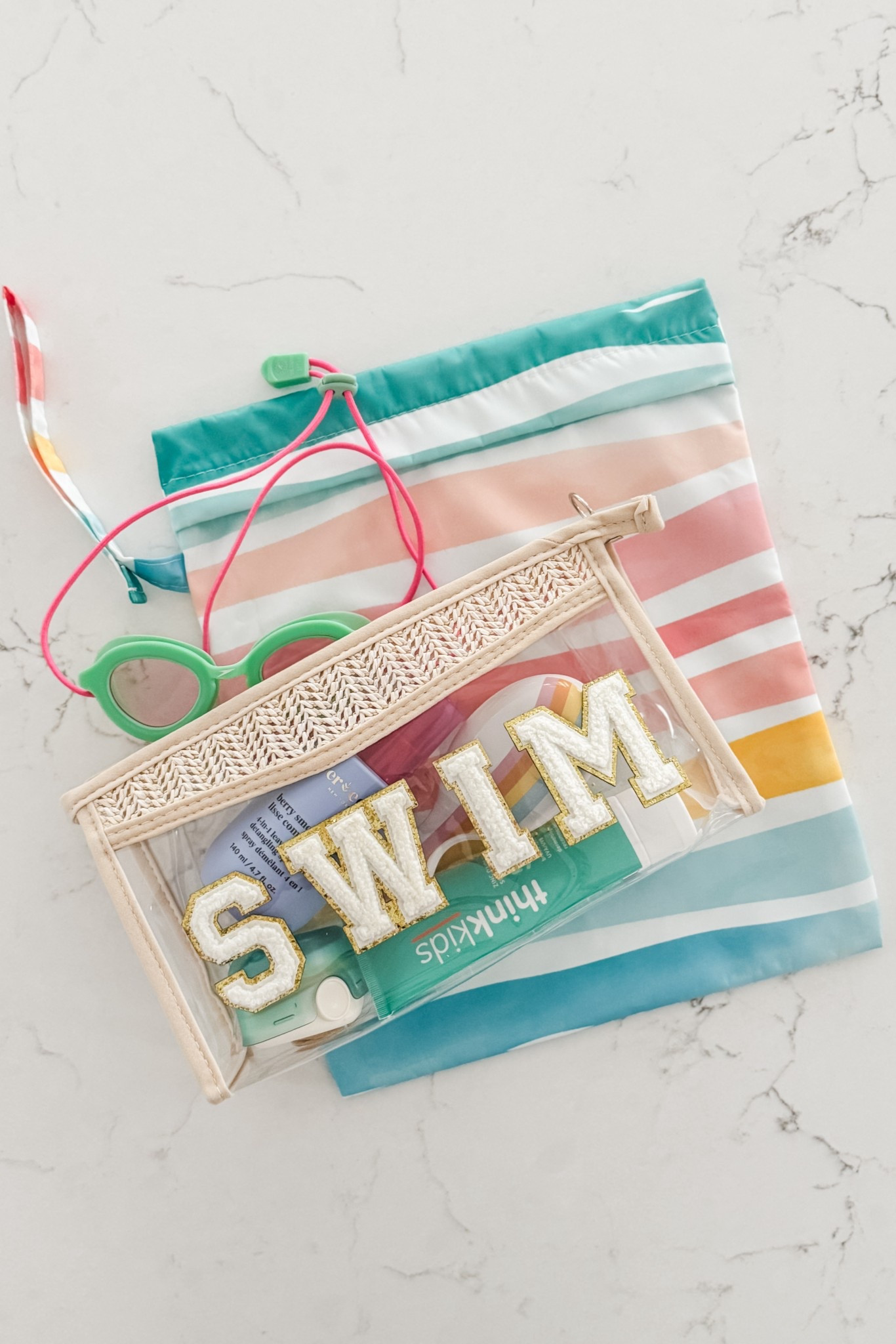 Getting our swim bag packed for #LTKSummer 💦

#LTKSwim #LTKKids