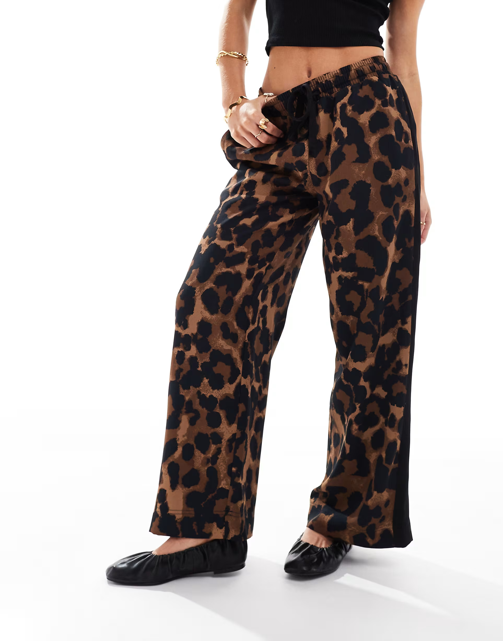 ASOS DESIGN Petite pull on pants with contrast panels in leopard print | ASOS (Global)