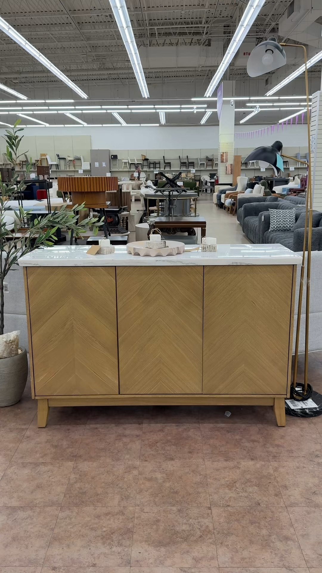 A statement piece with modern sophistication! 💫The Mairenn Marble Top Server brings together a sleek marble top, soft-touch doors, and warm burnished blonde ash veneers for a refined, contemporary look. ✨ The herringbone pattern adds subtle texture and visual intrigue, while the soft-close, hardware-free doors hide adjustable shelving for versatile storage. Perfect for a dining room, hallway, or any space that needs elevated style and practical function. 🤩
#ModernFurniture #HomeDecorInspo #Wayfair

#LTKSaleAlert #LTKHome