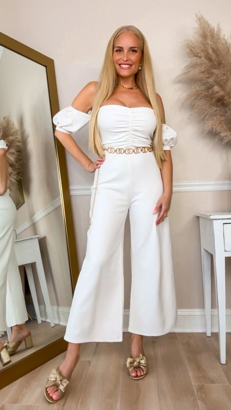 A beautiful white jumpsuit from Lulus! I love the smoothing ponte knit fabric. It is thick and stretchy and the jumpsuit is also fully lined. I love it with all these beautiful gold accessories! 

#LTKparties #LTKstyletip #LTKover40