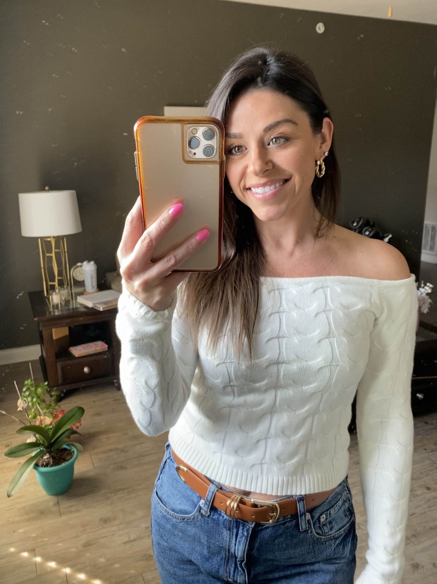 Casual off the shoulder white sweater, high waisted baggy jeans, belt, gold hoop earrings and ugg golden star clogs. An easy look for on the go!

#LTKShoeCrush #LTKStyleTip #LTKBeauty